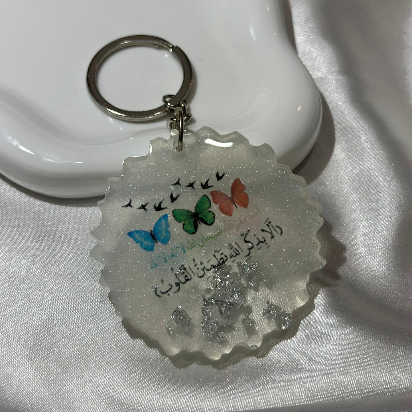 Quraan with colorful butterflies white cracked keychain