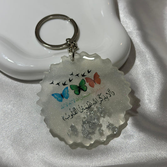 Quraan with colorful butterflies white cracked keychain