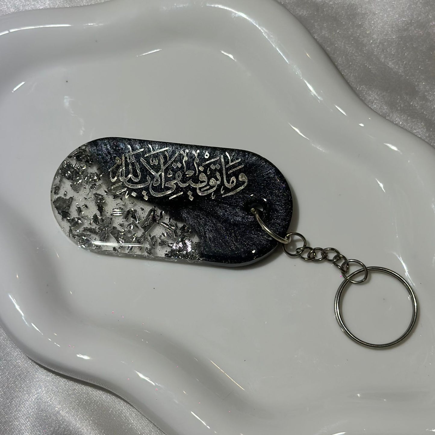 Quraan black and silver keychain